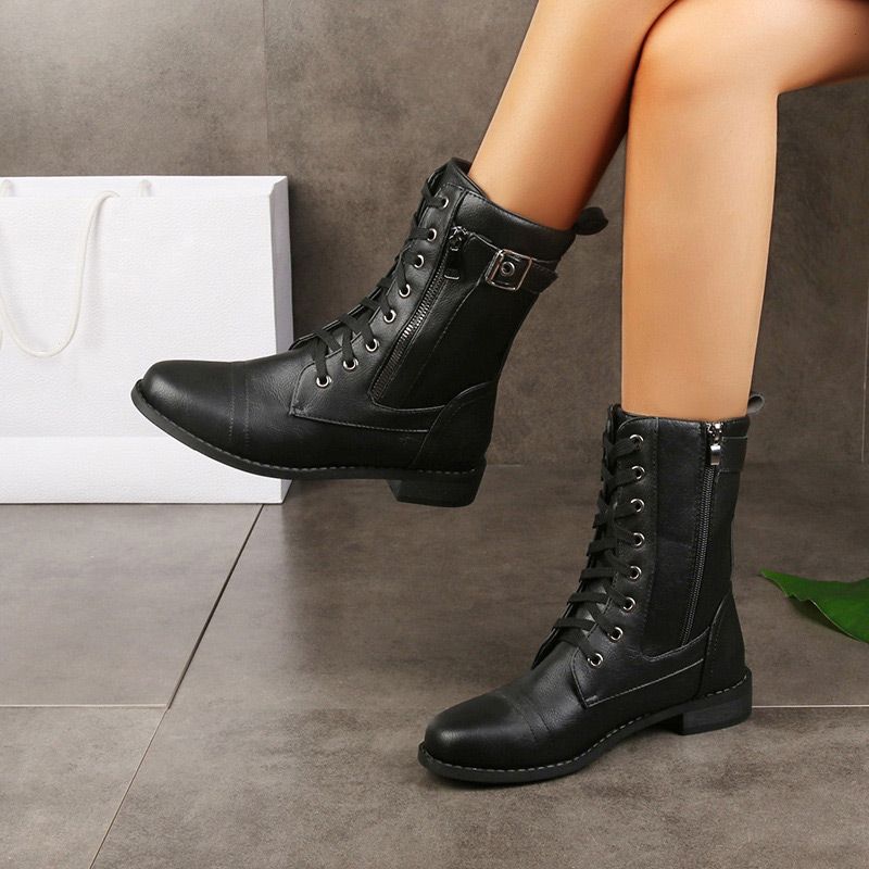 Botas de cuero con punta redonda y cremallera